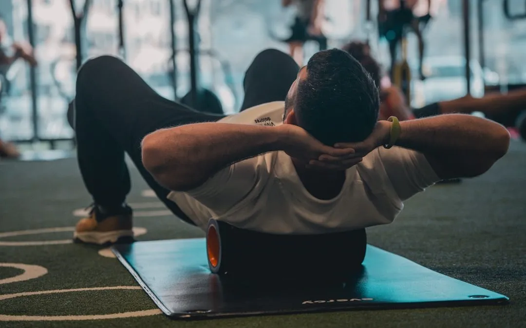 Participants in a movement session on a studio floor with open space